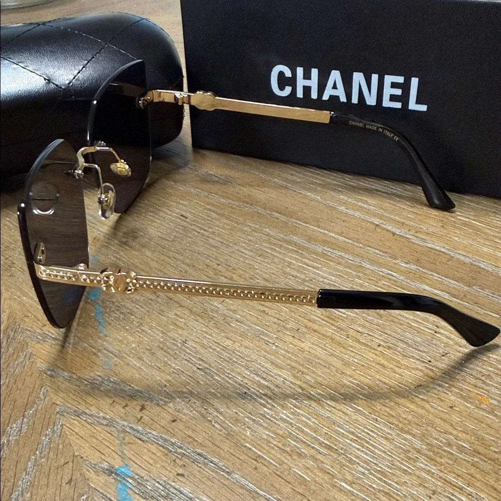 CHANEL Rimless Square Sunglasses in Black with Gold Details